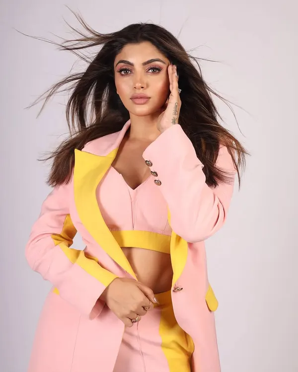 A vibrant studio portrait with a wind machine to add movement and energy. This is a great technique for fashion lookbooks to make the images feel more dynamic.