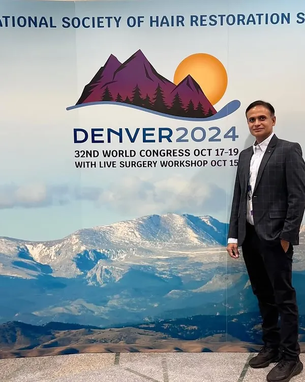 As a member of the International Society of Hair Restoration Surgery, I stay at the forefront of global standards. Here I am at the 32nd World Congress in Denver, where I was invited to share my research on hair transplant outcomes. My approach is always grounded in the latest science.