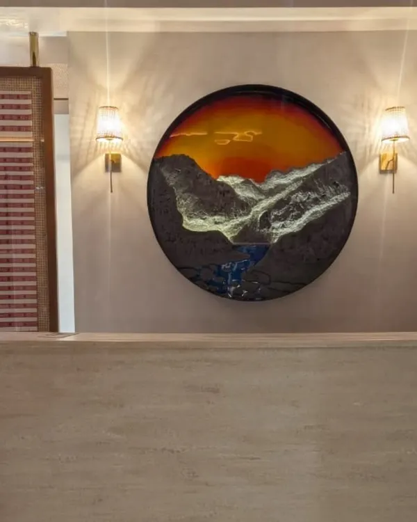 This is the "Land of Rising Sun" piece, finding its permanent home at Arunachal Bhavan in Delhi. Seeing my textured, hand-painted art installed in a beautifully designed space, under the perfect lighting, is a feeling I can't quite describe.