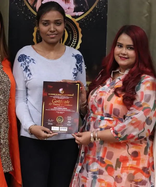 The best moment of any course is the certification ceremony. I am so proud to present this student with her government-authorized certificate, officially marking the start of her journey as a nail technician.
