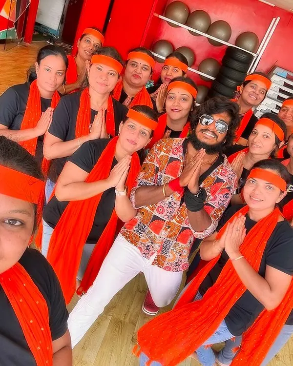 Our gang celebrating together with traditional saffron scarves. We are a family that respects our culture and values while getting fit.