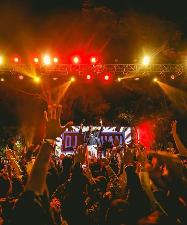 This is what I live for. Standing on the main stage at The Lalit Bangalore for a New Year's Eve gala, seeing thousands of hands in the air. This is the massive festival energy I bring, ensuring your event is the one everyone talks about.