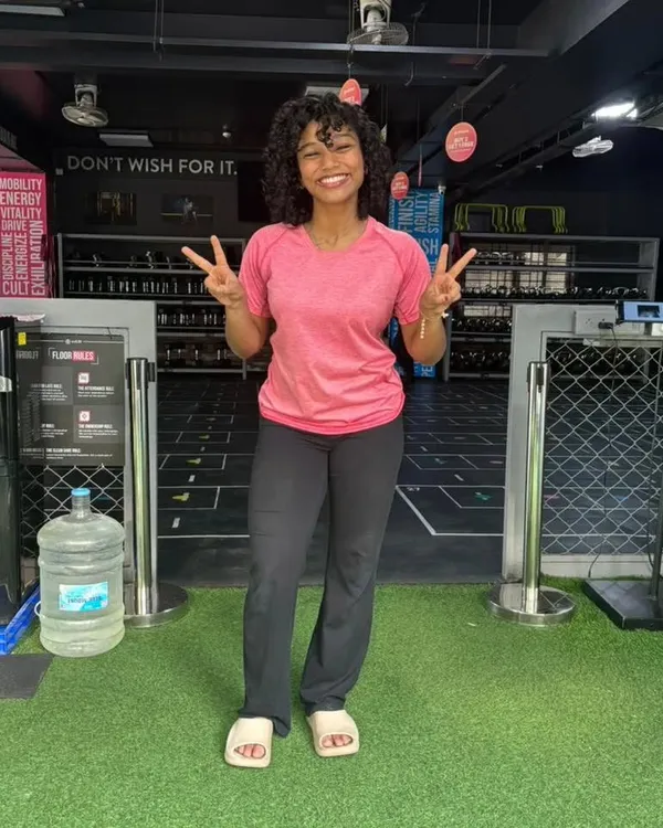 Just a happy moment at the gym. A good curl day, good lighting, and a simple smile are always worth capturing.
