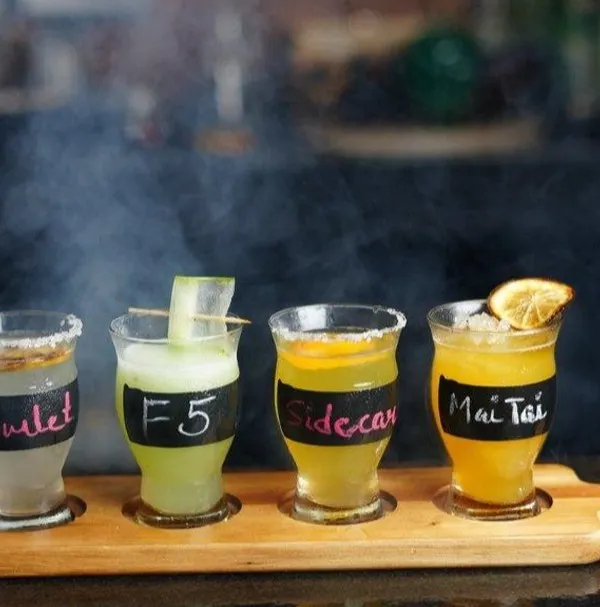 A flight of our classic cocktails: Gimlet, F5, Sidecar, and Mai Tai. It's the perfect way to sample our mixology skills and find your new favorite drink.