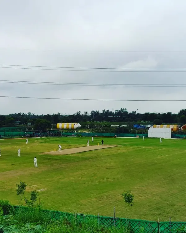 Our expansive and well-maintained cricket ground, ready for a full-fledged match. Playing on a proper ground is essential for developing field awareness and match temperament.