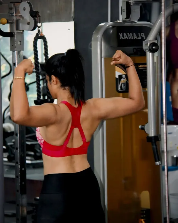 Strong is a lifestyle. This is the result of early morning workouts and disciplined training, focusing on building back and bicep strength.