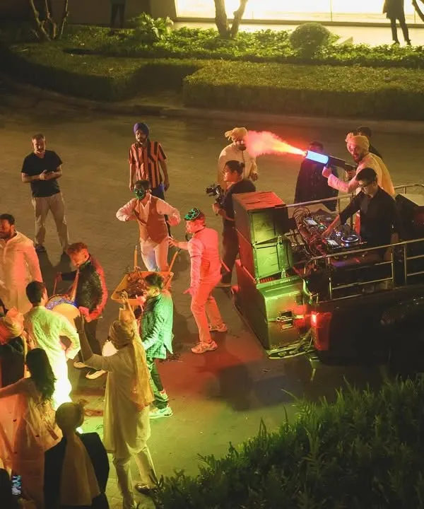 An aerial view of the Baraat madness. My mobile DJ truck is equipped with a CO2 cannon to hype up the crowd as we lead the procession.
