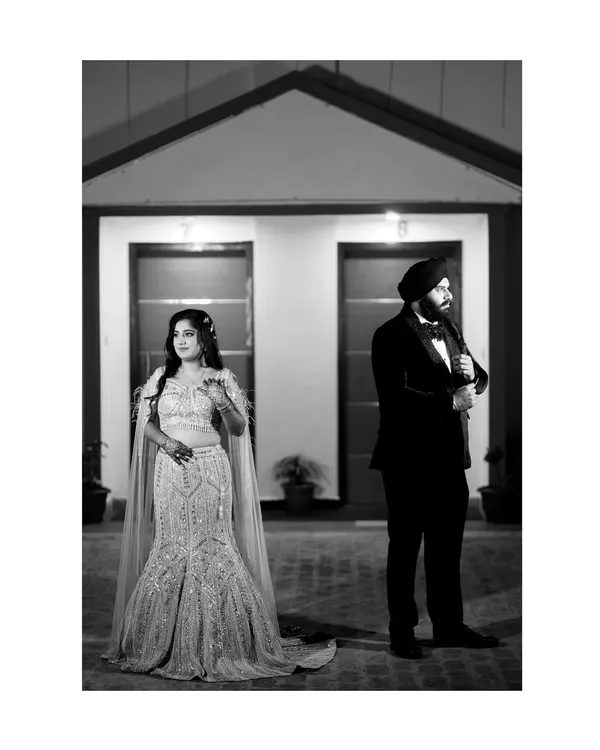 A classic black and white portrait that exudes formal elegance. The separate poses create a sense of anticipation and drama, perfect for a sophisticated pre-wedding or engagement announcement.