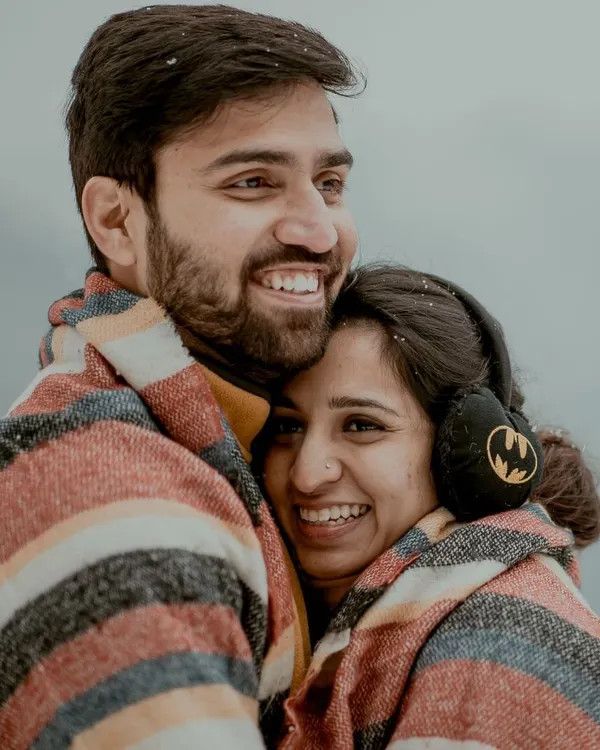 A quiet moment of warmth against the cold. This is what it's all about, finding comfort in each other, forgetting the camera is even there. This candid portrait from a snowy Dalhousie pre-wedding shoot captures the pure, unscripted joy I strive for.