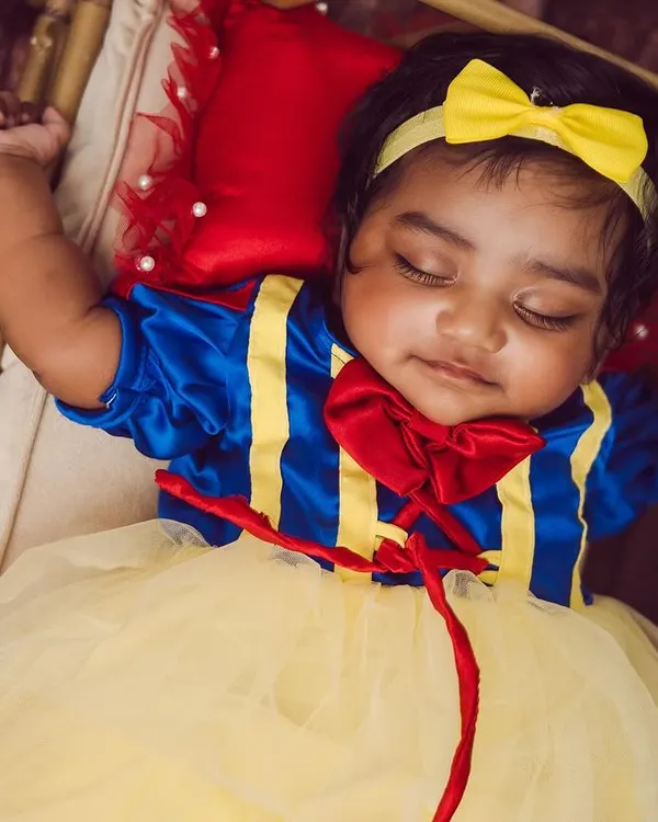 Our little Snow White, looking absolutely perfect. We provide the full costume and set, including the miniature bed and woodland props, for a complete fairytale experience.