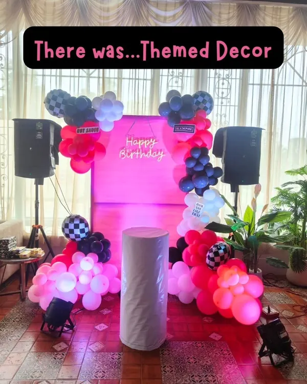 This was the setup for our BLACKPINK themed party, complete with a pink neon sign, a checkerboard and pink balloon arch, and a full sound system. We create an immersive environment that makes kids feel like superstars.