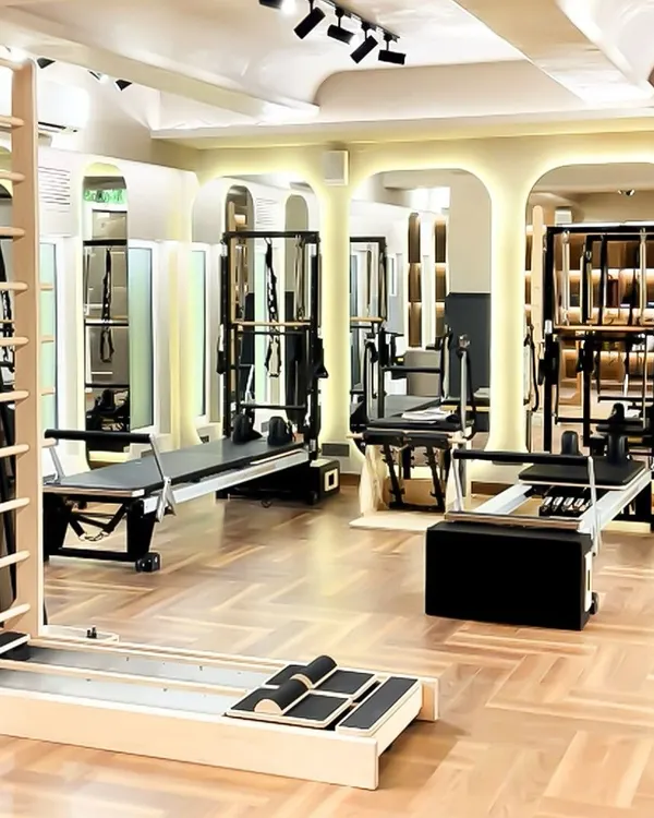 This is your haven for movement and mindfulness. Our spacious and brightly lit studio features a full range of Pilates equipment, from reformers to the Cadillac, in a pristine setting.