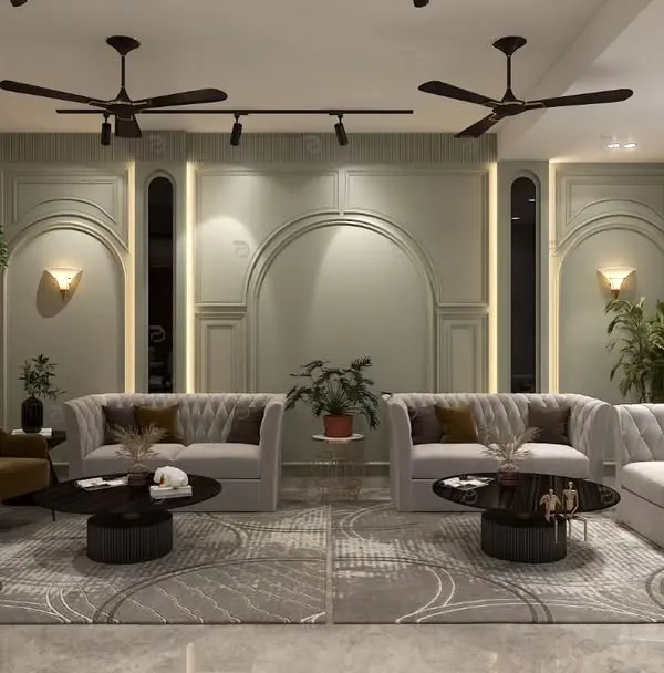 We design living rooms that are both grand and inviting. This space uses a soothing pastel green palette, neo-classical wall mouldings, and layered lighting to create an atmosphere of calm sophistication, perfect for both relaxing and entertaining.