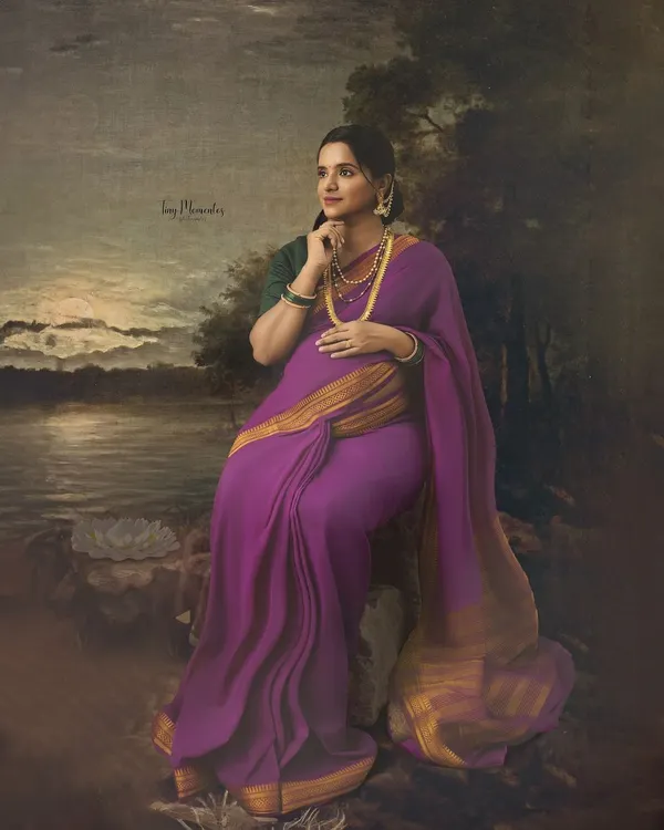 Inspired by the master artist Ravi Varma, this fine art portrait places a mother-to-be in a classic, painterly landscape, transforming a photo into a timeless piece of art.