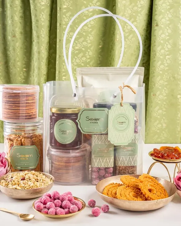 A wedding gift should feel like a pause, a quiet smile before the celebration begins. This hamper is filled with golden laddoos, crunchy chaklis, and wholesome snacks that carry stories and warmth.