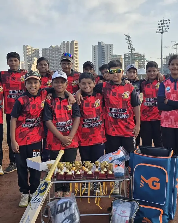 The Inningstar Tigers team posing with their trophies after our 6th Anniversary tournament. A proud moment for our players and coaches.