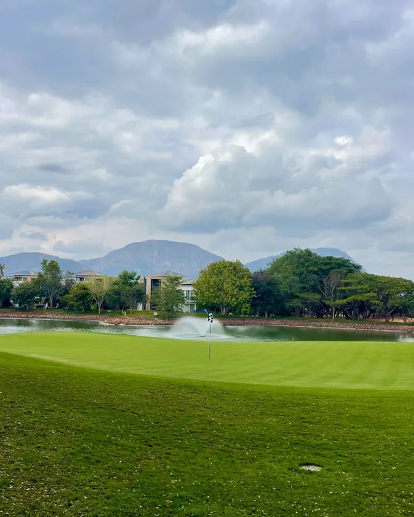 A view of the stunning landscape at one of the courses where I coach. Playing with a backdrop of mountains and water hazards makes every round a memorable experience.