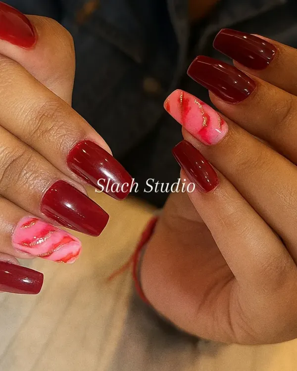 This set is all about making a statement. I used a rich burgundy polish on square extensions and created two accent nails with a pink marble design and flecks of gold foil for a touch of luxury.
