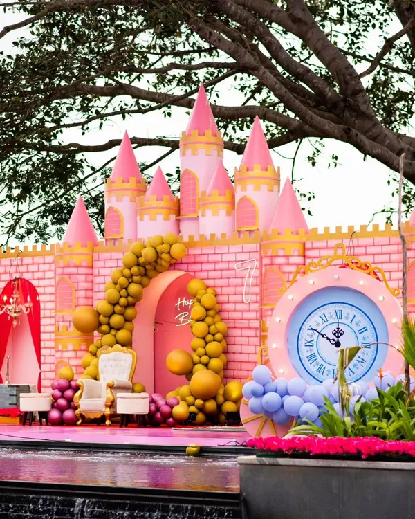 I believe every child deserves a fairytale, and for this party, I built a life-sized princess castle right by the water. This grand entrance set the stage for a magical day, complete with royal details and a clock striking party time.