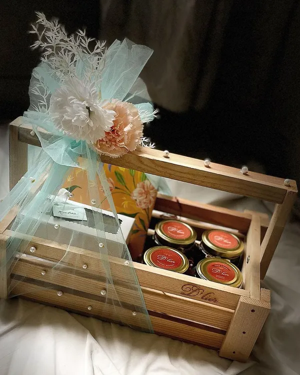 Our most luxurious Rakhi Hamper, presented in a rustic wooden crate. This grand gift contains a box of 16 truffles, brownies, Regal Riches, and multiple jars of our cookies and choco almonds, making it the ultimate celebratory gesture for your sibling.