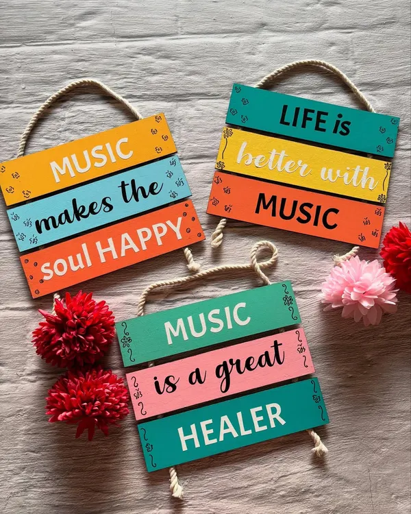 For the music lovers! A set of three colorful wall hangings with quotes like "Music makes the soul happy" and "Life is better with music."