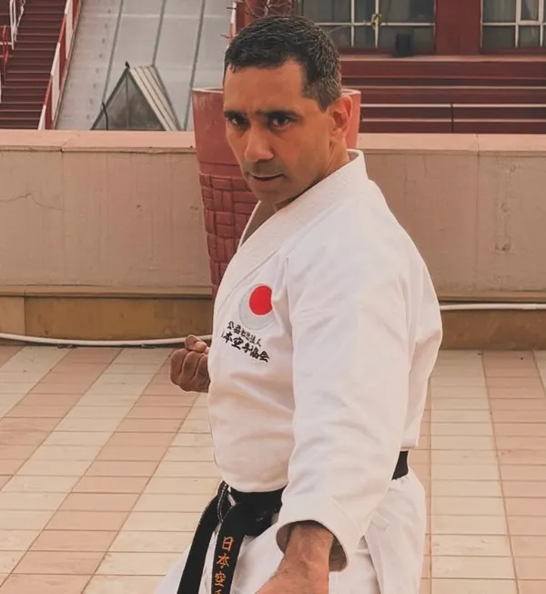 A moment of focus before training begins. As a black belt and instructor, I believe that every day presents a new opportunity to refine my technique and deepen my understanding of the art.