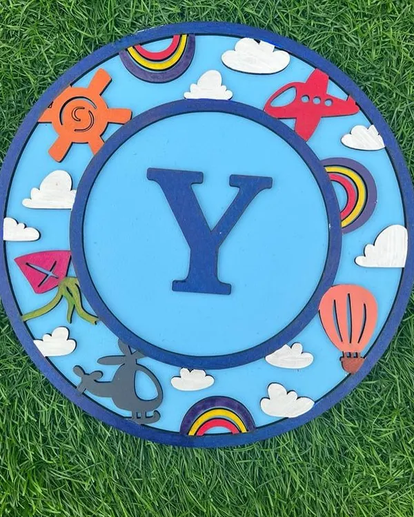 For the little adventurer with their head in the clouds! This travel themed monogram kit features the letter 'Y' surrounded by airplanes, kites, and hot air balloons. It’s a perfect way to personalize a child's room decor.
