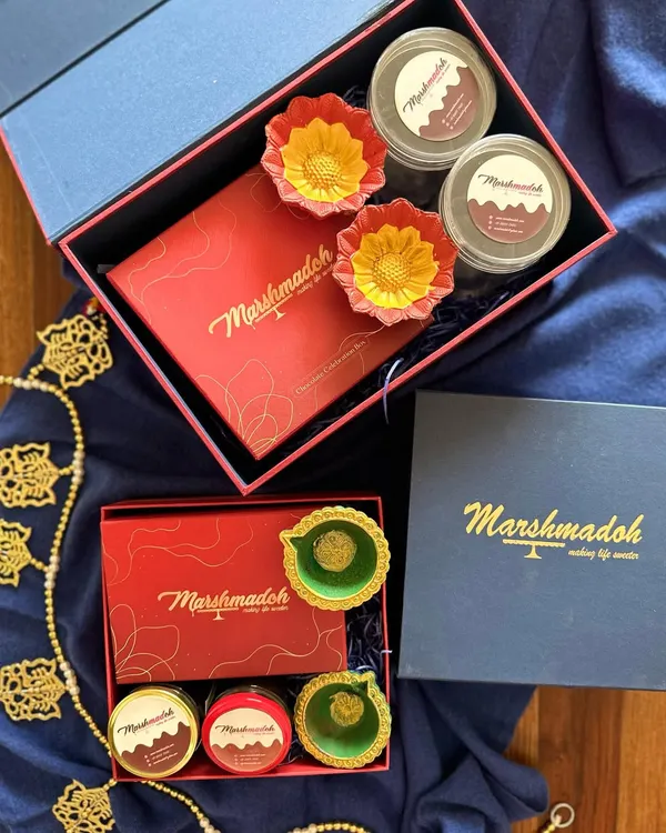 I believe gifting is an expression of *pyaar*, and my hampers are designed to share that feeling. This is a look at my festive celebration boxes, featuring sturdy, elegant packaging and filled with homemade treats.