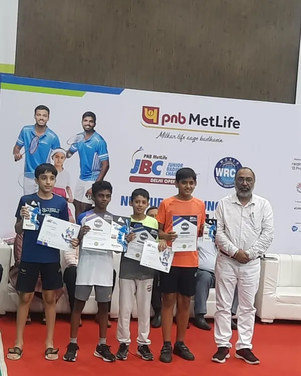 Our young champions holding their certificates and trophies at the PNB MetLife Junior Badminton Championship. Their amazing performance led to one gold and three bronze medals for the academy.