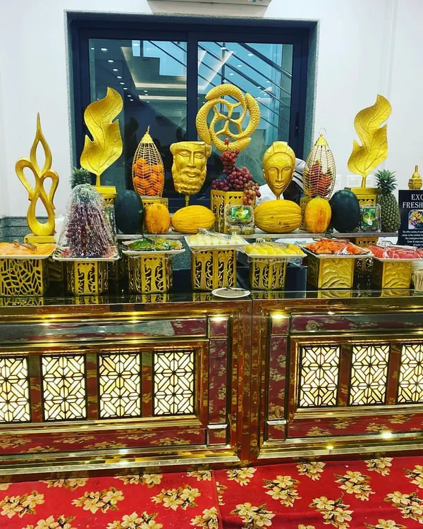 Our exotic fresh fruit station, featuring elaborate carvings and a colorful assortment of seasonal fruits. This station adds a healthy, visually stunning element to any buffet.