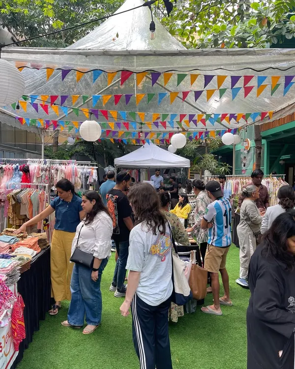 A snapshot of the lively atmosphere at one of my events. Families are browsing through stalls decorated with colorful bunting, discovering all the wonderful products our vendors have to offer.