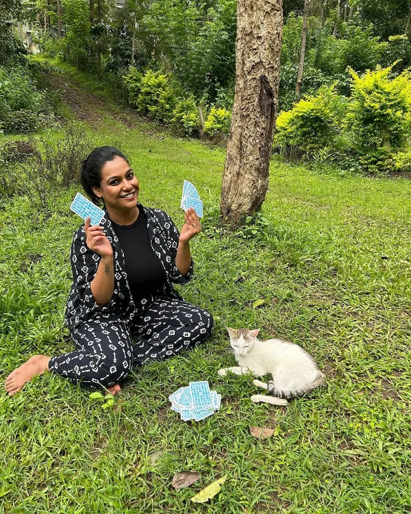 At my happiest, sitting in the grass with my cards and a sweet cat. This is pure bliss for me. I am available for personal tarot sessions or to help you learn tarot yourself.