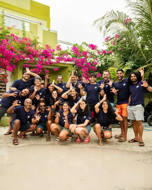 The 'shark sign' is mandatory after a successful tiger shark trip in Fuvamulah, Maldives. This group was an absolute riot, and their energy was infectious.
