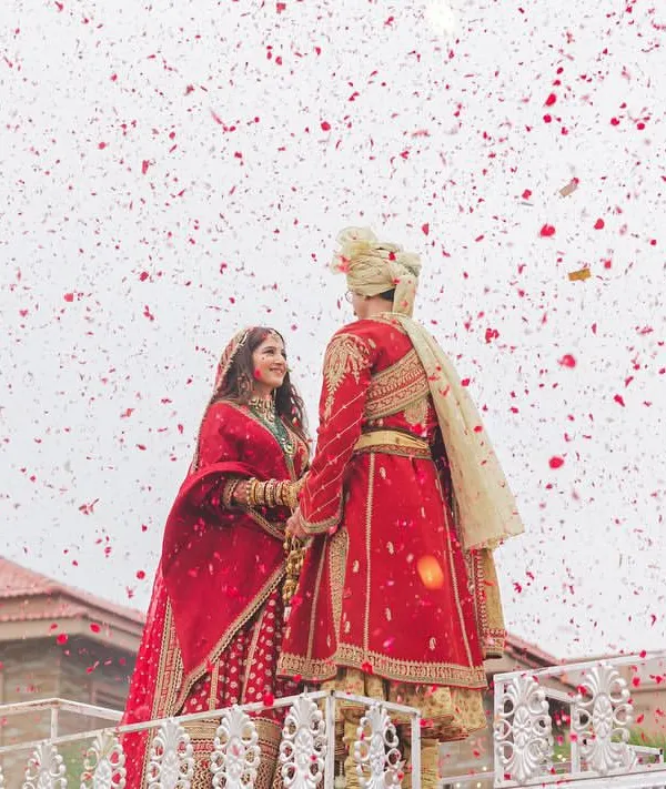A fairytale moment sealed with a shower of petals. This is what happily ever after looks like. I orchestrate these iconic varmala moments that you will cherish for a lifetime. ✨