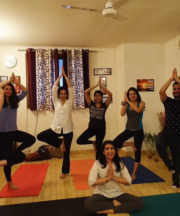 The beautiful energy of a group class at my Delhi studio. Here we are practicing Vrikshasana, the tree pose, finding balance and strength together as a community.