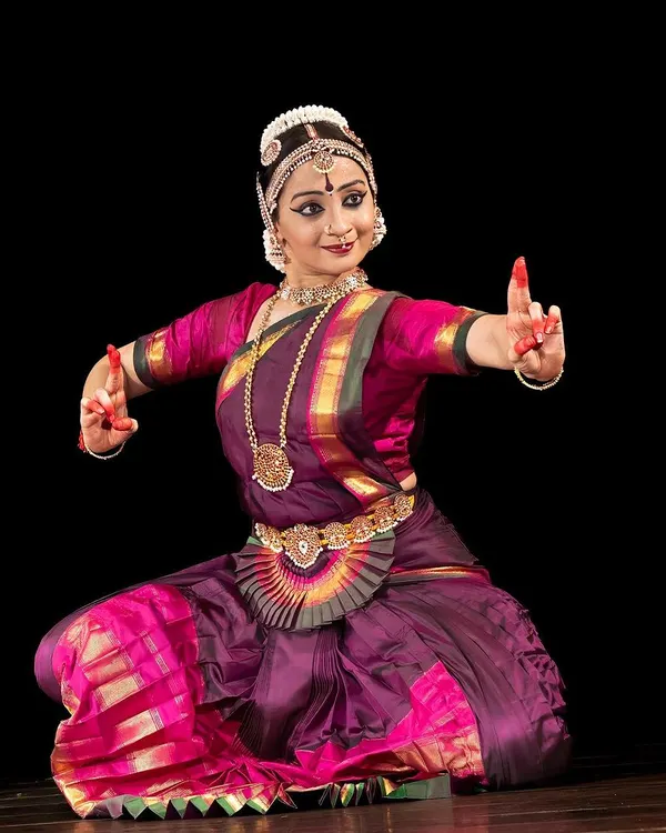 A moment of stillness in the Aramandi posture, the foundational half-sitting pose in Bharatanatyam. This posture is central to building the strength and grace required for the art form, and is a key focus for beginners in my classes.