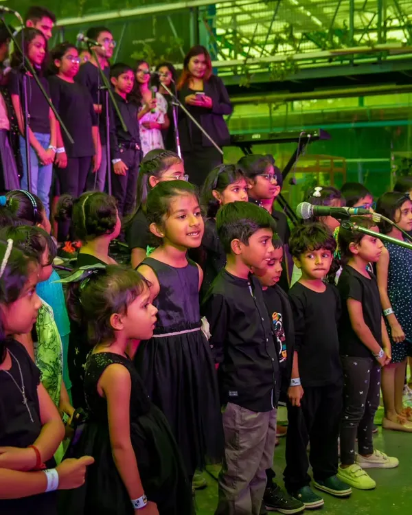Our amazing student choir lighting up the stage at our annual showcase. It's incredible to see so many young voices come together to create something beautiful.