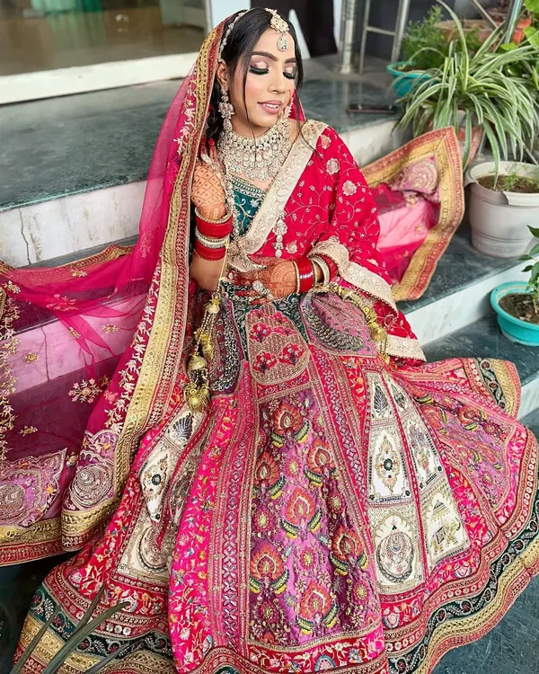 A stunning bridal makeup look created during a demo session. This image showcases the intricate detail and professional quality our students learn to achieve for a bride's special day.