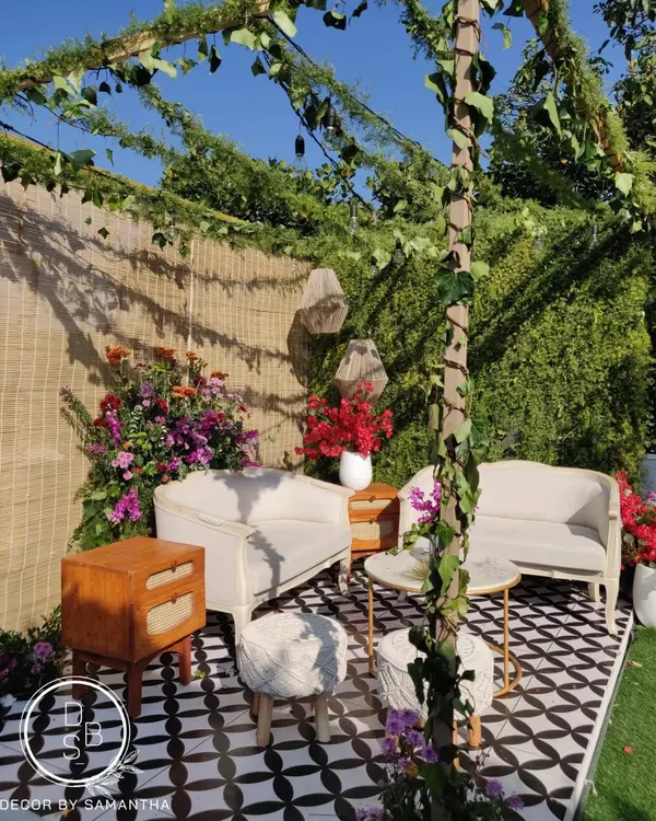 This cozy lounge corner, set up for an intimate terrace wedding, stole my heart. The mix of patterned tiles, natural textures, and colorful flowers created a perfect spot for sunset pheras.