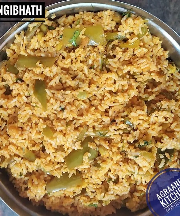 This is Vangibhath, a classic brinjal rice dish from Karnataka. I make it with a special Vangibhath powder that I prepare at home, ensuring an authentic and aromatic flavor in every bite.