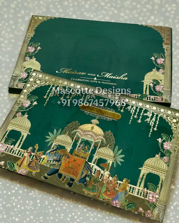 A celebration of heritage, art, and love. This hardback Pichwai-themed wedding invite brings a royal procession to life against a rich emerald green, capturing the grandeur of a traditional Indian wedding.