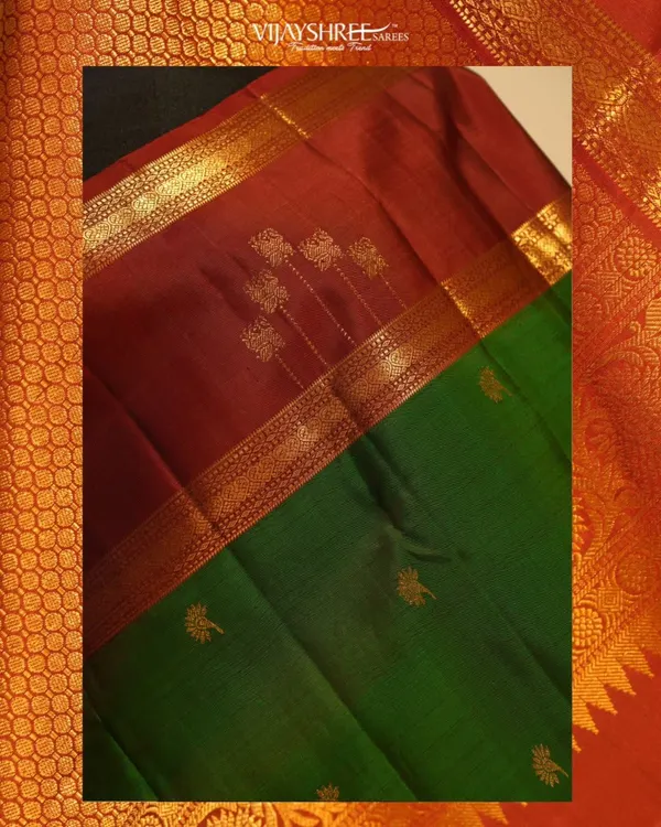A classic Kanjivaram in maroon and green, featuring a traditional Korvai border where the two colors are interlocked by hand on the loom.