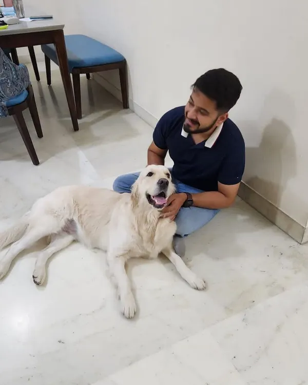 Here I am sharing a moment with Barfi the Golden Retriever. Building a positive, happy relationship with the dogs I train is just as important as the obedience work. A happy dog is an eager student.