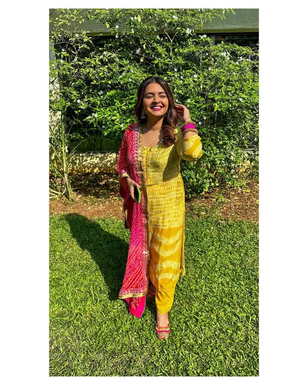 My Diwali look, featuring a bright yellow and pink bandhani suit. I love playing with vibrant colors and traditional prints for festive occasions.