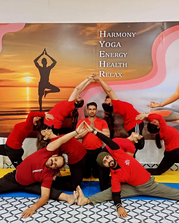 Here we are exploring a creative group formation in our Acro Yoga class. This practice is a beautiful way to build connection and achieve poses you never thought possible.