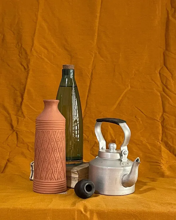 A still life arrangement prepared for a drawing and painting class. We teach students to observe the interplay of light, shadow, texture, and reflection on different objects, a crucial step in creating realistic artwork.