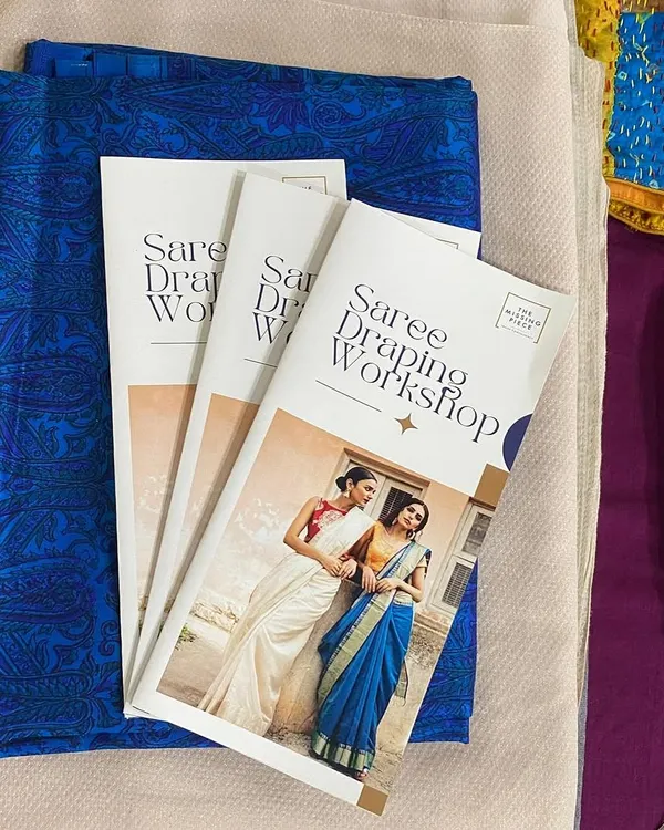 A look at the "Saree Draping Workshop" handbook we use in our sessions. It's filled with practical tips and visual guides to help you master different draping styles.