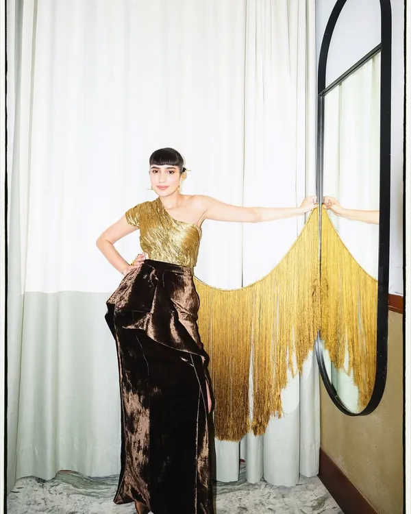For a GQ Best Dressed feature, I wore this antique gold sculpted textile corset with a deconstructed silk velvet skirt, a look that plays with texture and form.