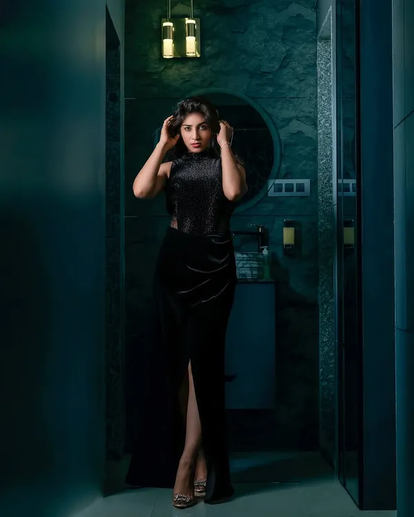 This is where fashion comes to life. I use dramatic lighting and specific posing to create powerful, couture-style portraits like this one in my Kharghar studio. This shot highlights the elegance of the garment and the model's confident presence, perfect for a high-end lookbook or a standout portfolio piece.
