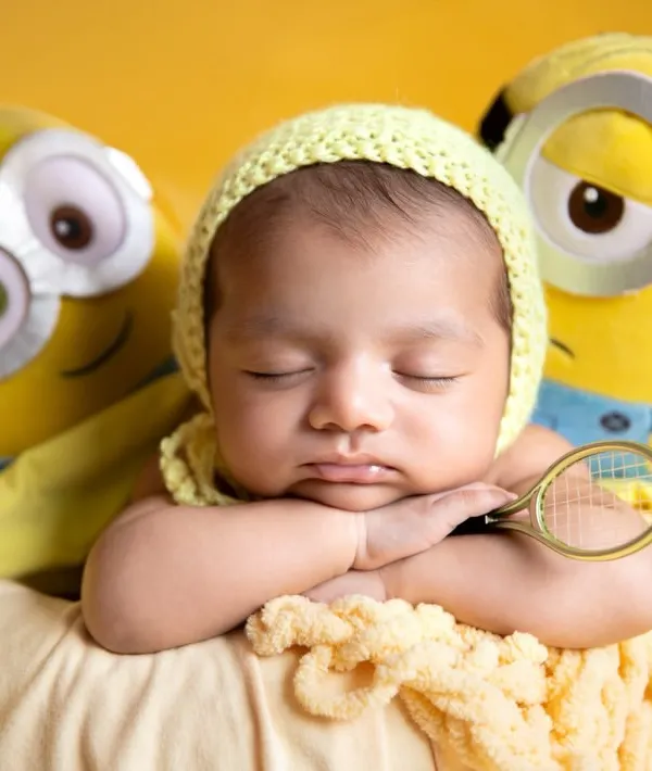 A close-up of our little Minion fan. The tiny tennis racket is a fun, quirky detail that adds so much personality to this themed shoot.